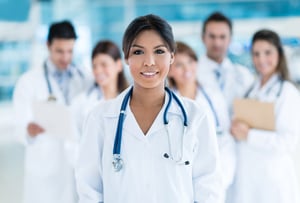 Female doctor at the hospital with her team